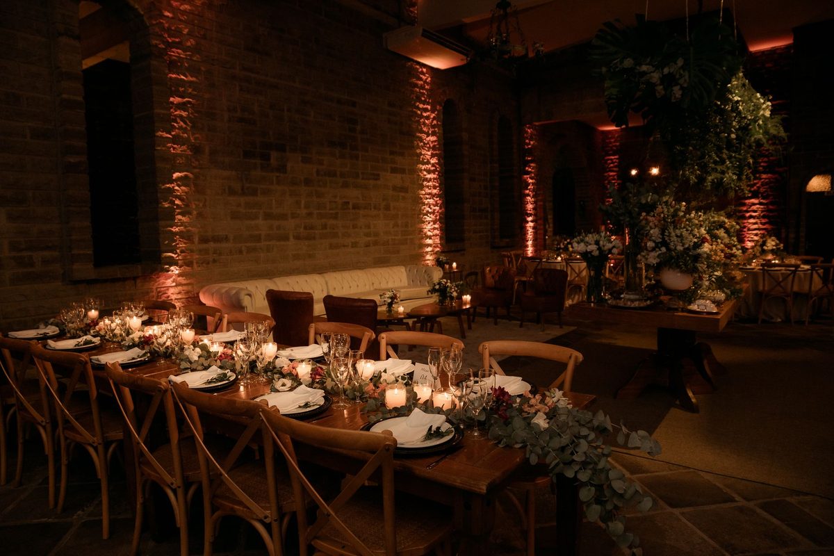 A table set for a wedding reception in the Braid Room