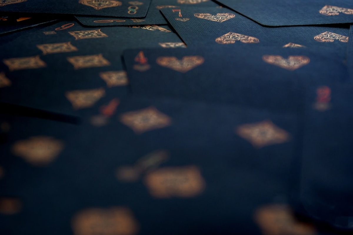 Playing cards on the felt of a blackjack table