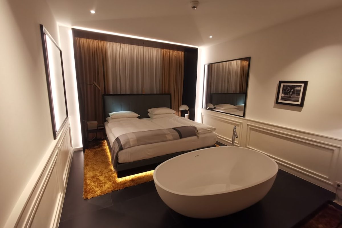 A Cape Suite with a freestanding bath beside the window