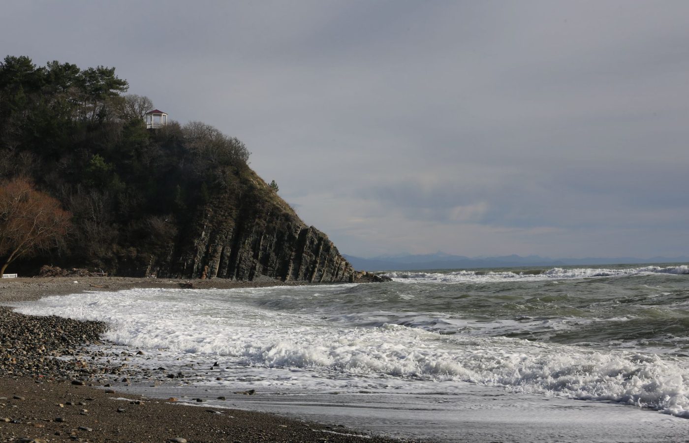 Grey surf and cliffs on the coast east of Christchurch